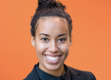 Photo of Ayana Crawford over an orange background